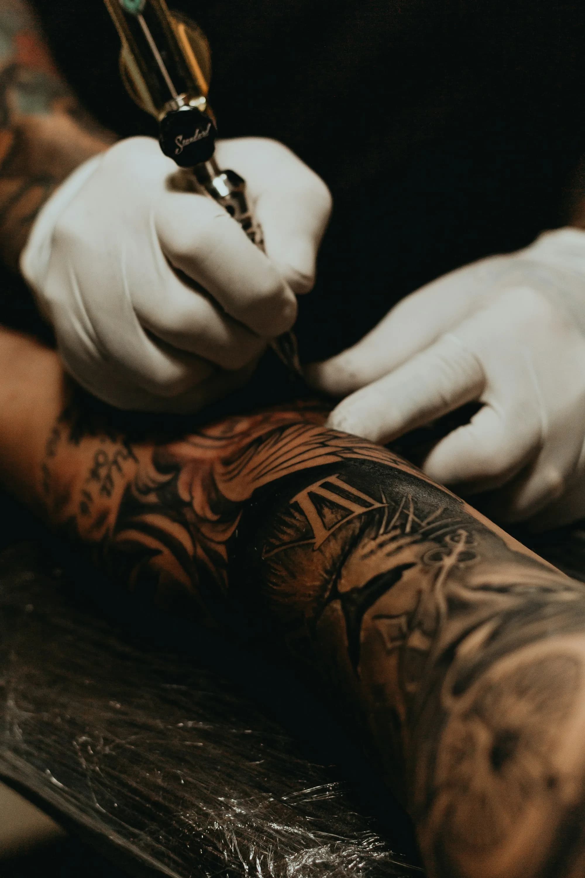 Close-up of detailed tattoo work in progress